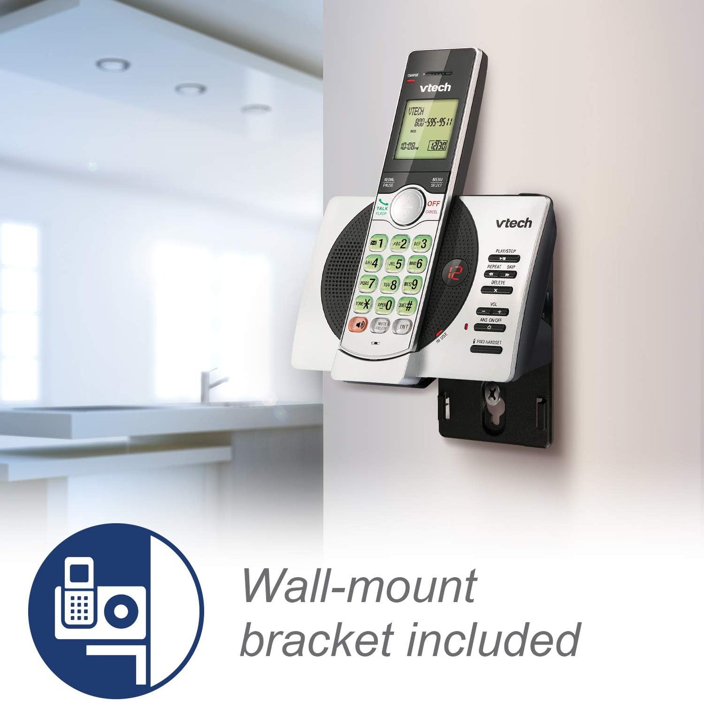 Vtech cordless phone with wall mount bracket on a white wall.