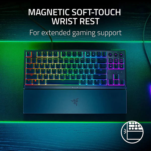 Gaming keyboard with a magnetic soft-touch wrist rest on a dark background