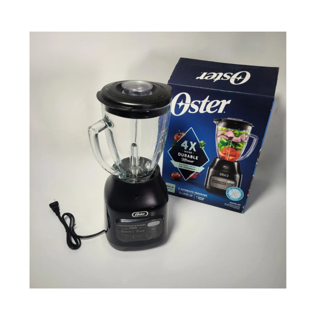 Black Oster blender with packaging on a white background