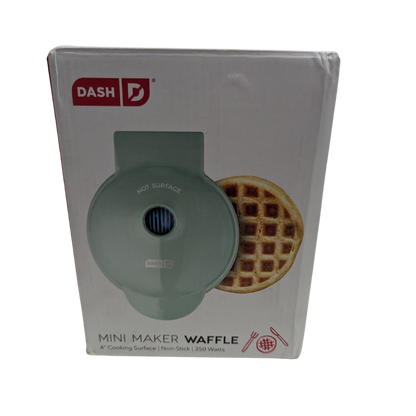 Box of Dash mini waffle maker with a waffle on the packaging.