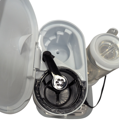 Close-up of a medical device with a clear cover on a white background