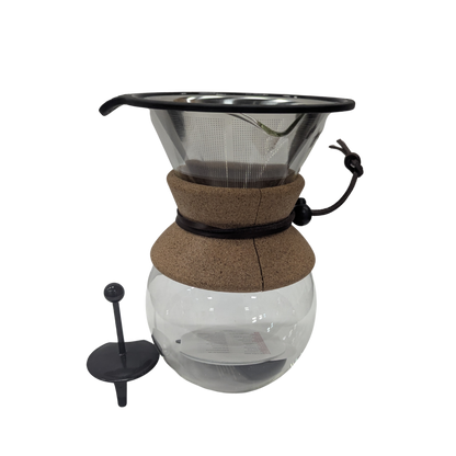 Clear glass coffee brewer with brown sleeve and black lid on a white background