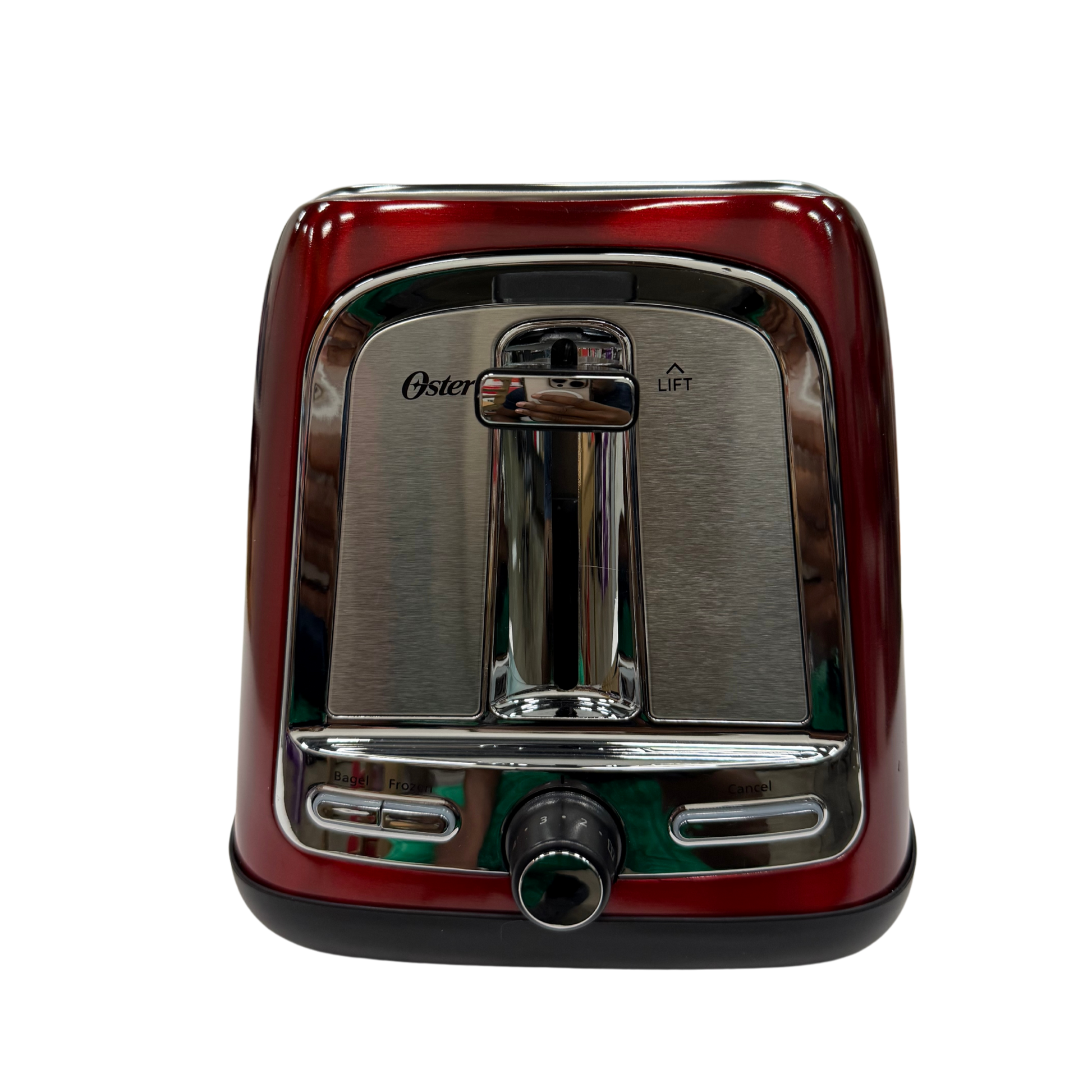 Red toaster with metallic finish on a white background
