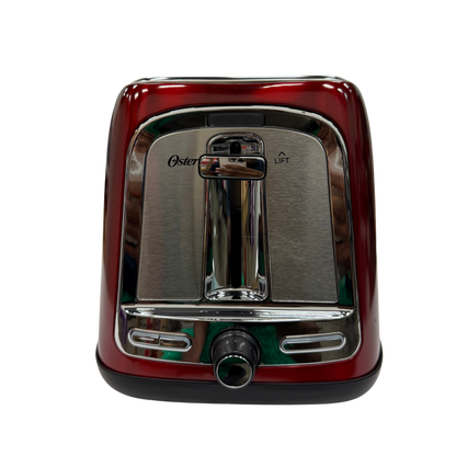 Red toaster with metallic finish on a white background