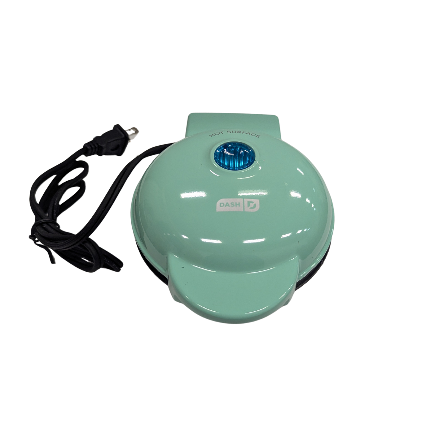 Green waffle maker with a power cord on a white background