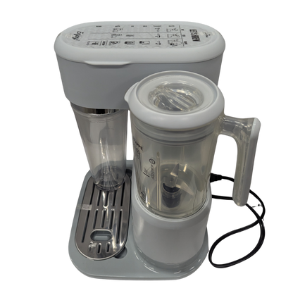 White kitchen appliance with clear container on a white background