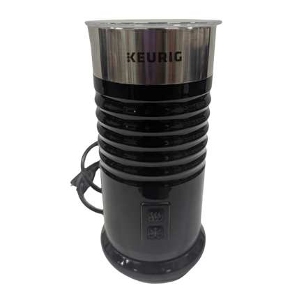 Black and silver Keurig coffee maker on a white background