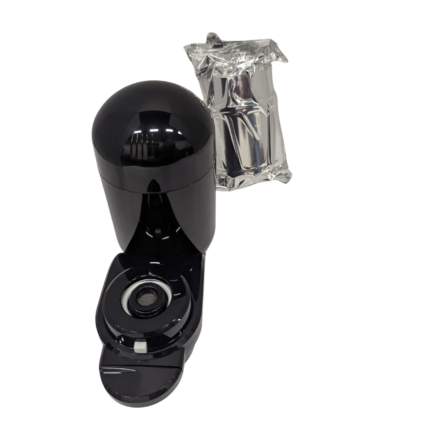 Black pepper grinder with clear salt shaker on a white background