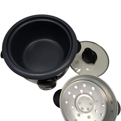Black pot with a silver steamer basket on a white background