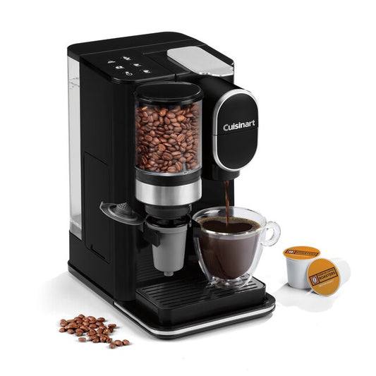 Cuisinart coffee maker with a glass of coffee and coffee beans on a white background