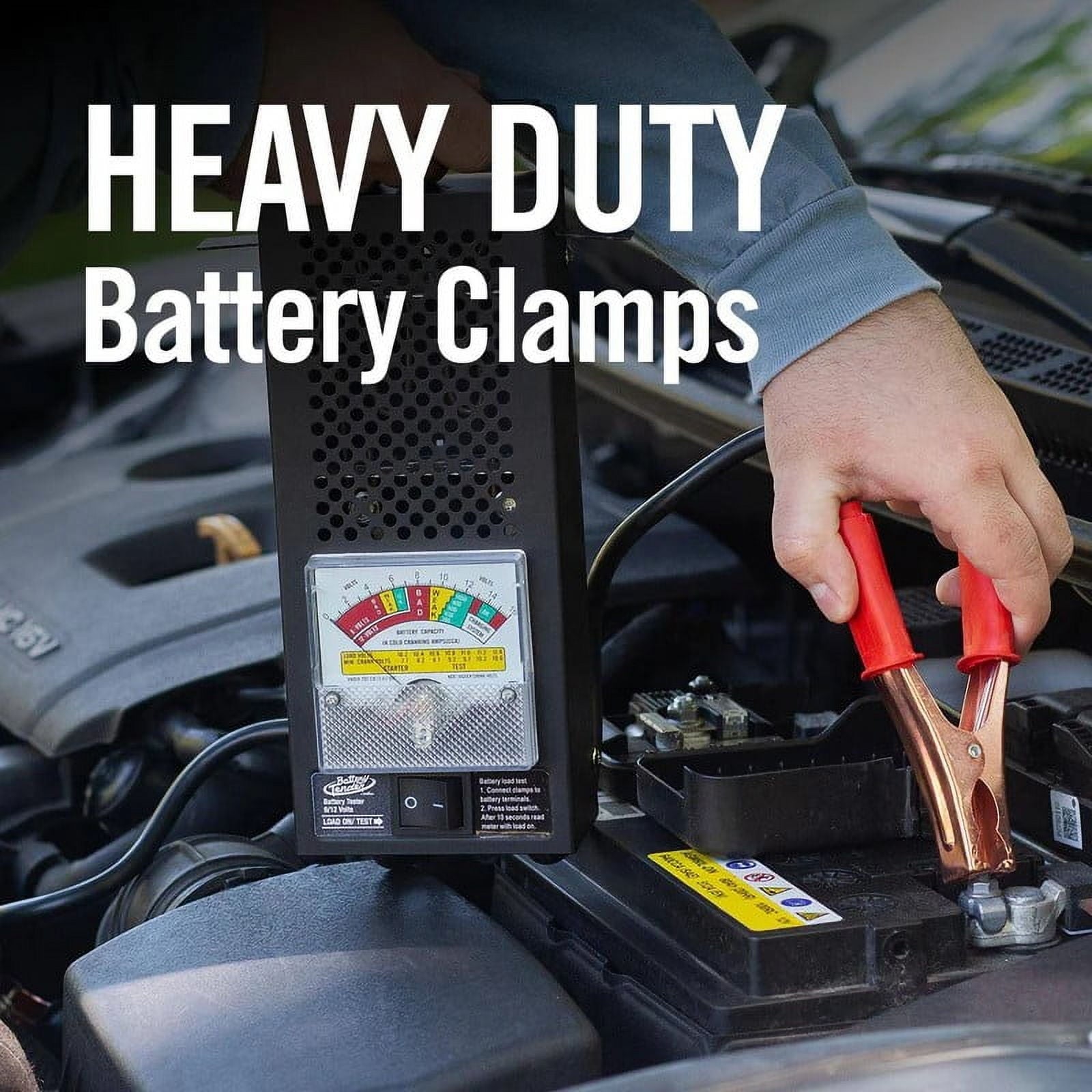 Person using heavy-duty battery clamps on a car battery with text 'HEAVY DUTY Battery Clamps'.