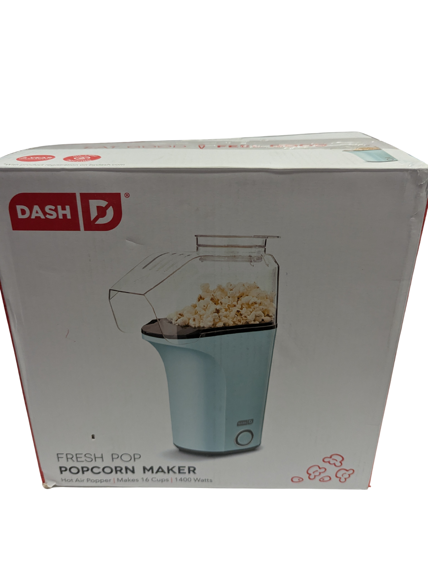 Box of Dash popcorn maker with a clear window showing popcorn inside.