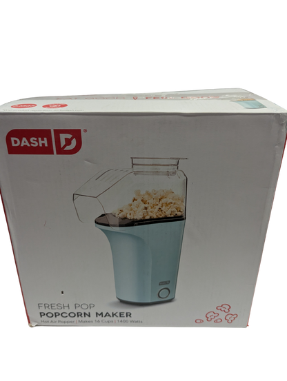 Box of Dash popcorn maker with a clear window showing popcorn inside.