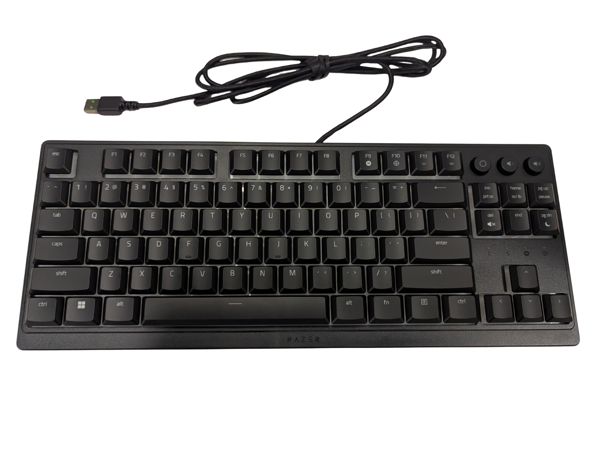 Black keyboard with USB cable on a white background