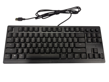 Black keyboard with USB cable on a white background