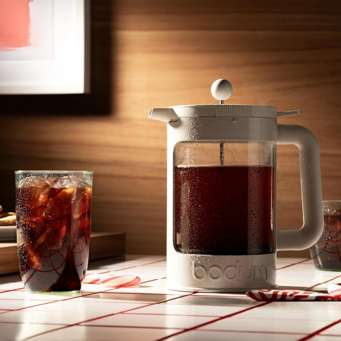 Bodum White French press with coffee on a wooden table