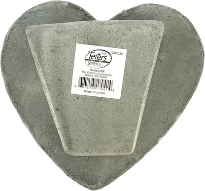 Heart-shaped concrete block with a label on a white background