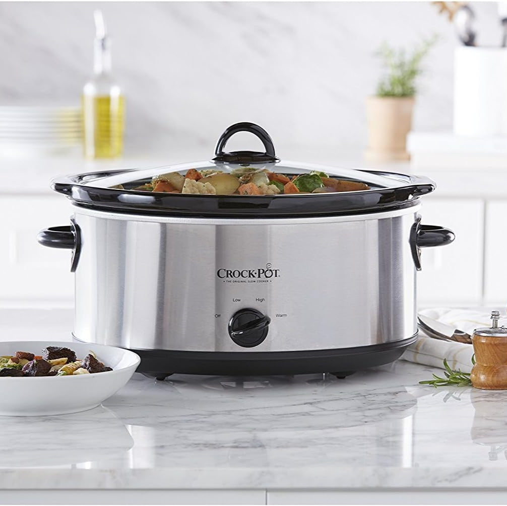 Crock-Pot slow cooker on a kitchen counter with food inside