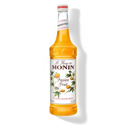 Monin Passion Fruit syrup bottle on a white background