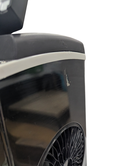 Black air conditioner unit on a white background