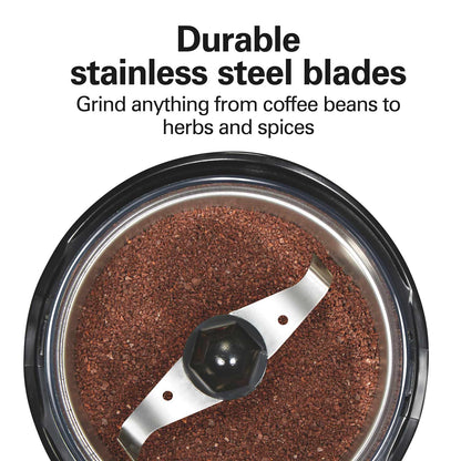 Coffee grinder with ground coffee and text about durable stainless steel blades