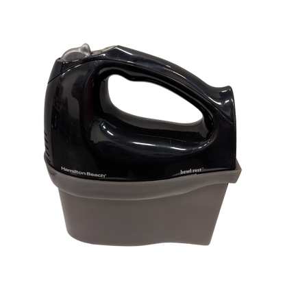 Black and gray hand mixer on a white background