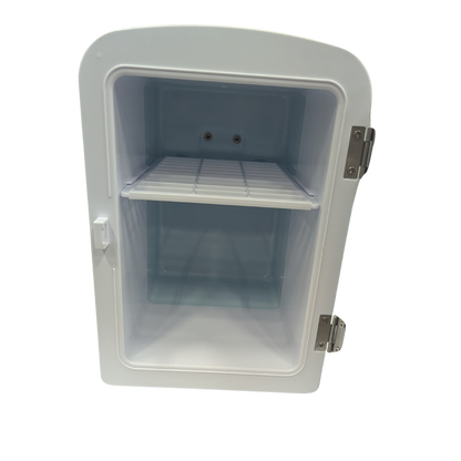 Small white refrigerator with a single shelf on a white background