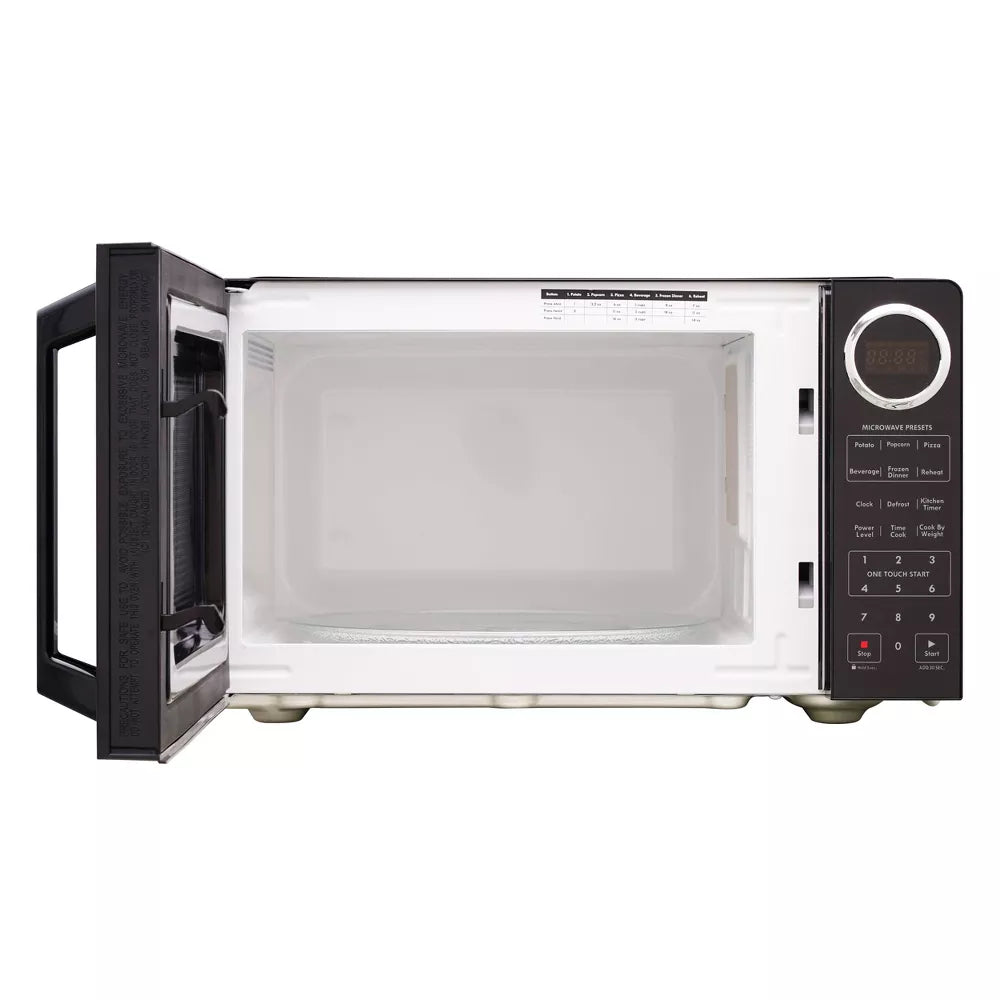 Black and silver microwave oven on a white background