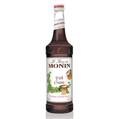 Bottle of Monin Irish Cream syrup on a white background
