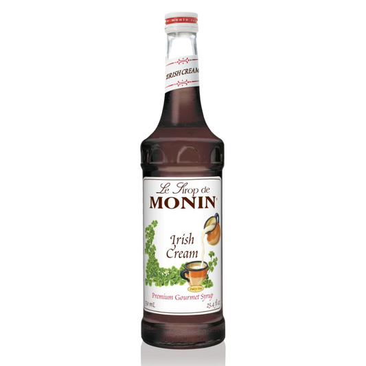 Bottle of Monin Irish Cream syrup on a white background