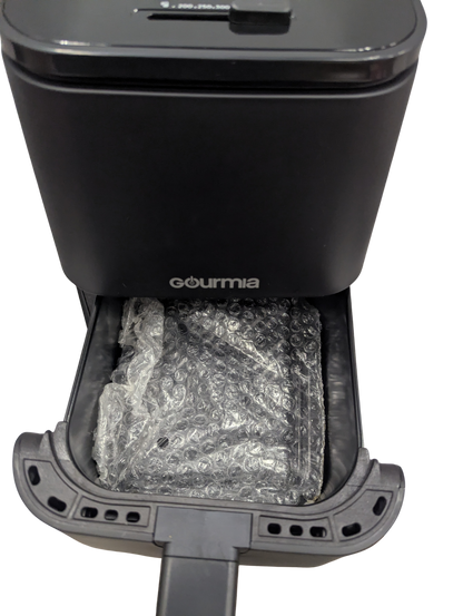 Black Gourmia coffee grinder with a clear container showing ground coffee.