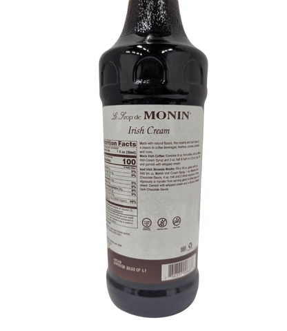 Monin Irish Cream syrup bottle on a white background