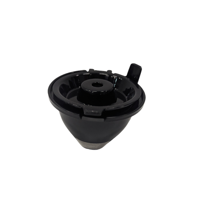 Black plastic component on a white background