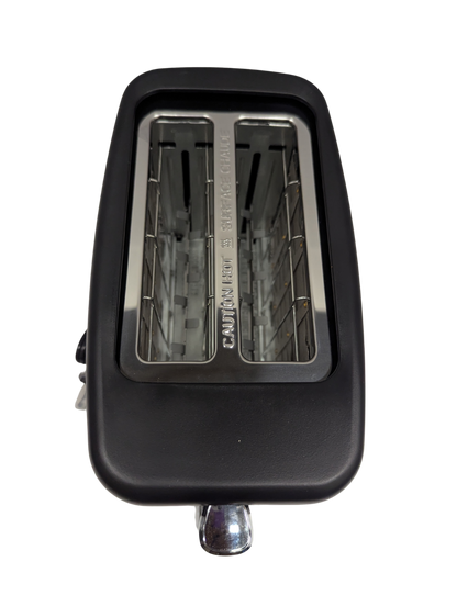 Black metal pedal with a textured surface on a white background