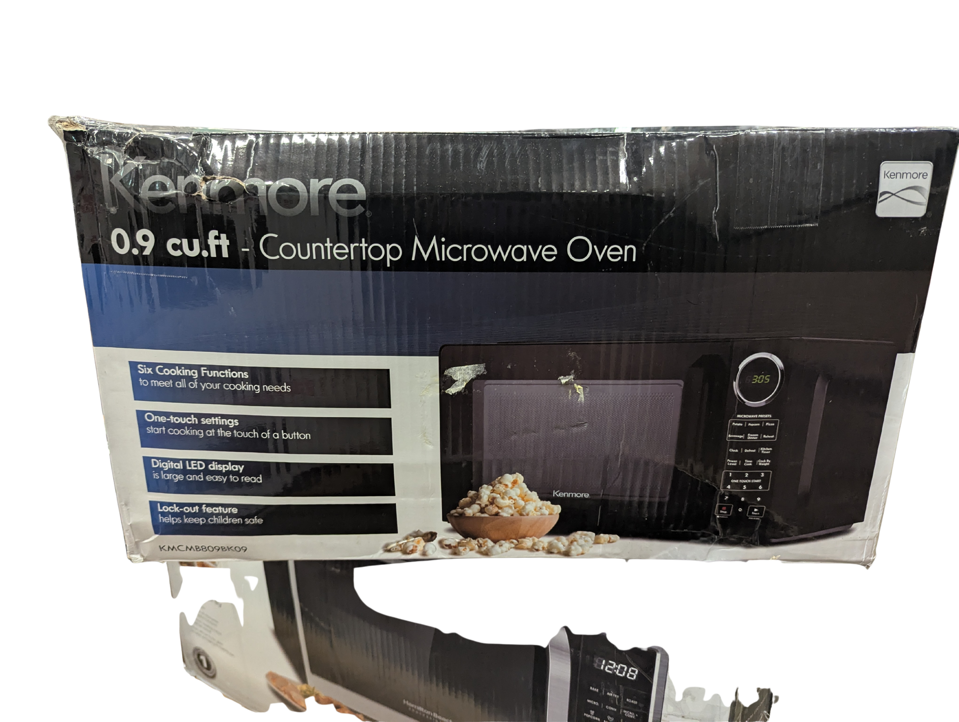 Kenmore microwave oven packaging on a white background