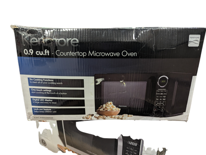 Kenmore microwave oven packaging on a white background