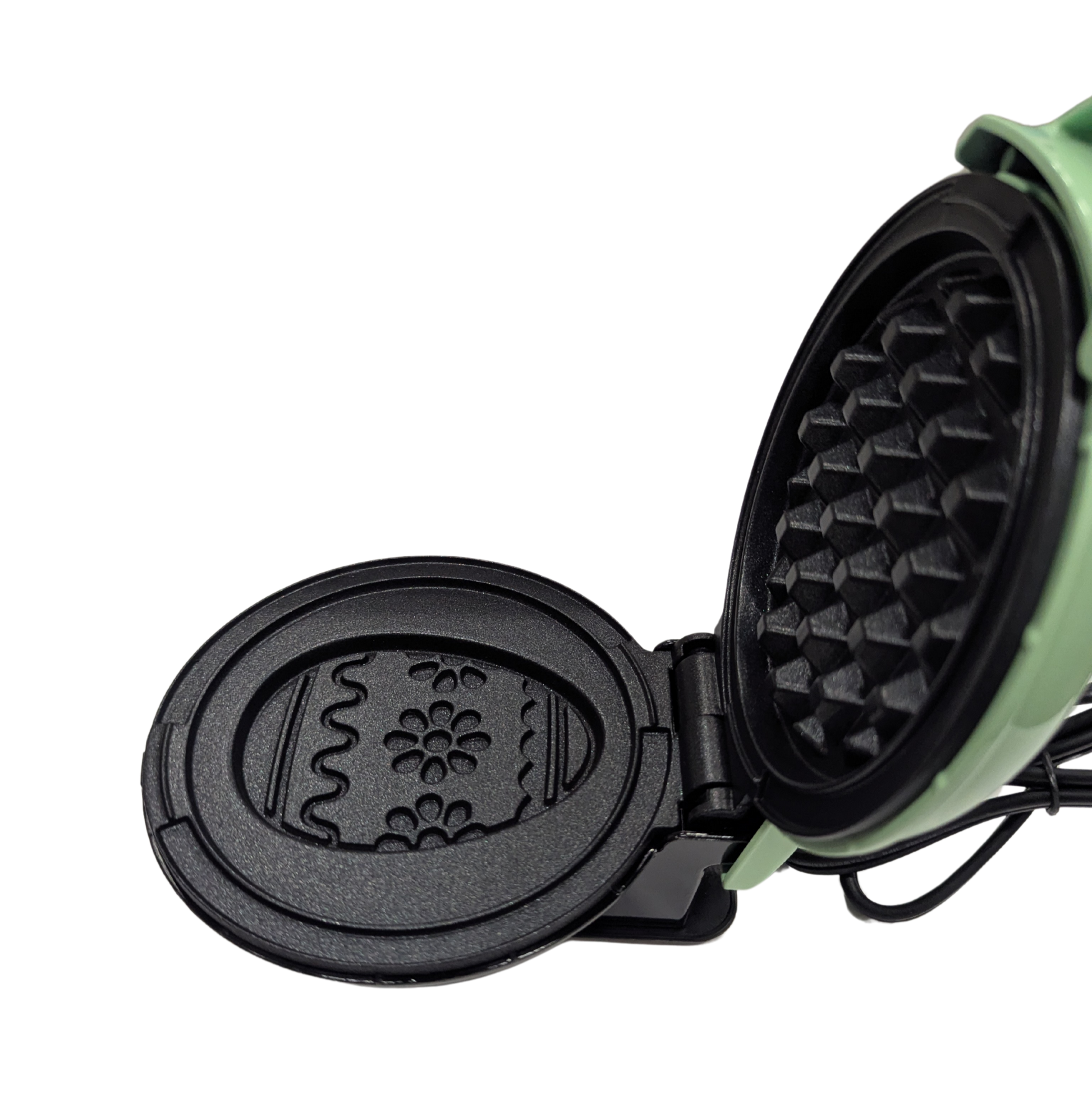 Waffle maker with open lid on a white background