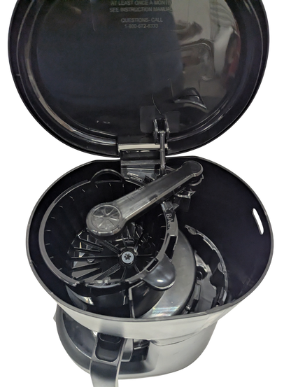 Portable stove with open lid on a white background