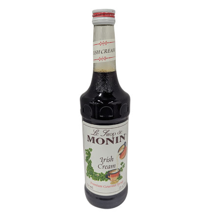 Bottle of Monin Irish Cream syrup on a white background