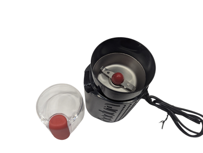 Black electric coffee grinder with clear container on a white background