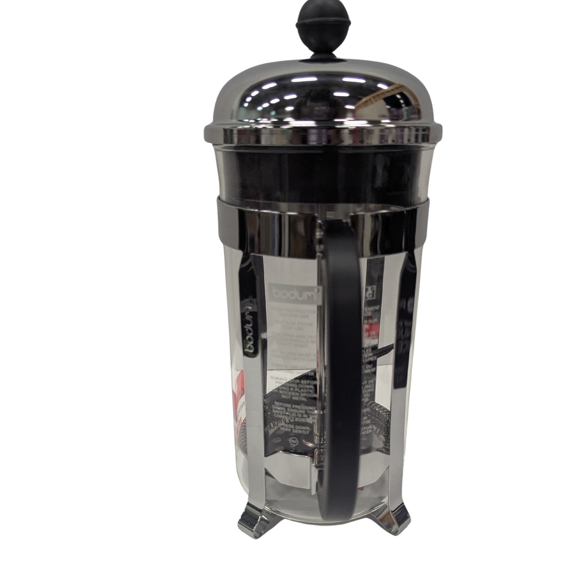 Black and silver French press coffee maker on a white background