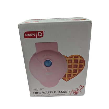Box of a pink heart-shaped mini waffle maker with 'Dash' branding.