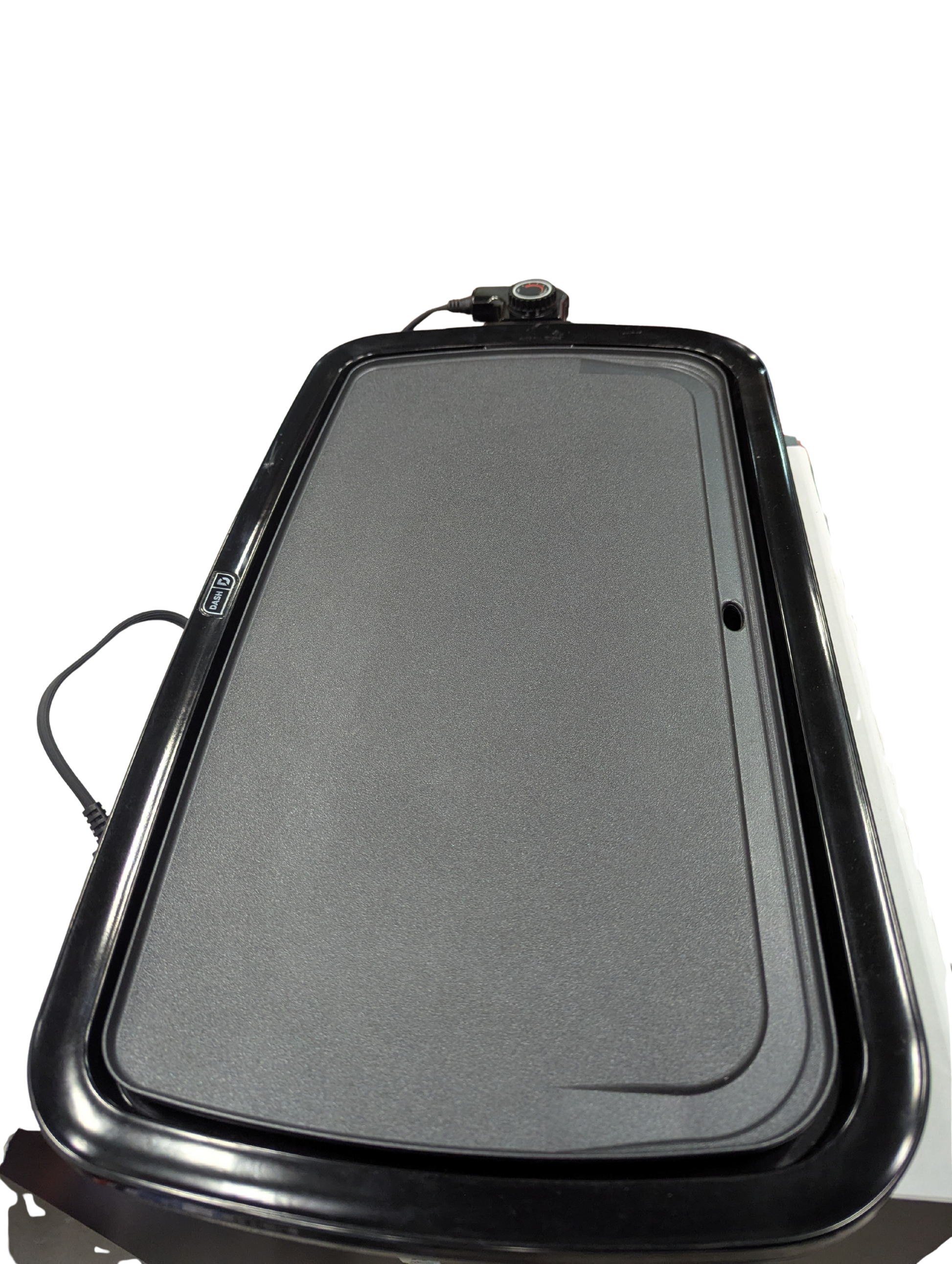Black rectangular griddle on a white background