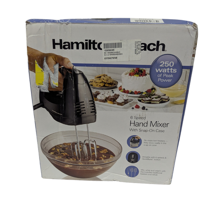 Boxed Hamilton Beach hand mixer with images of a bowl and cake on the packaging.