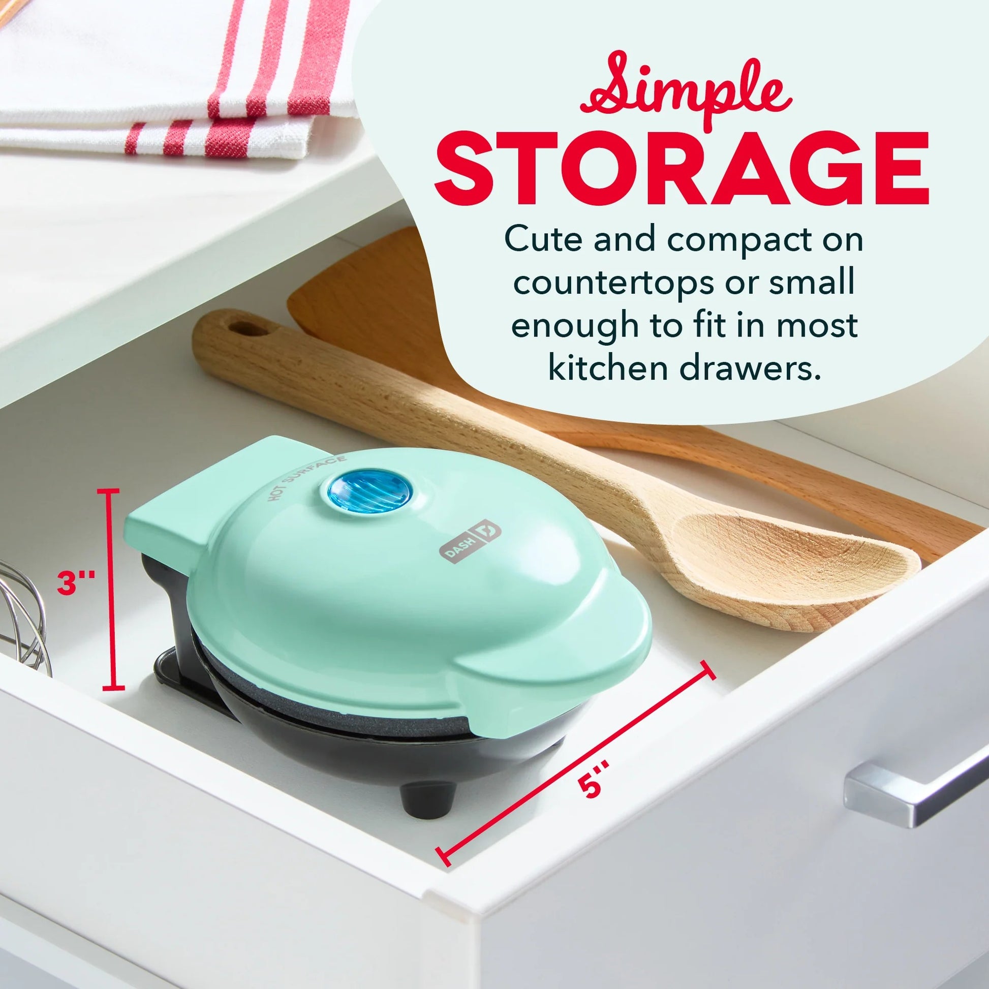 Compact green appliance on a kitchen counter with text about storage.