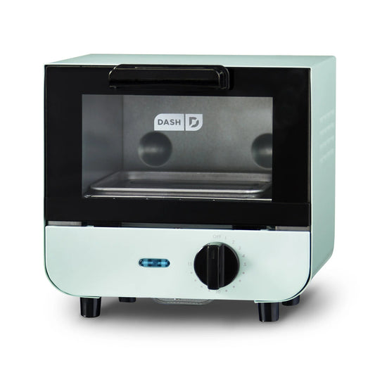 Mint green toaster oven with black interior on a white background