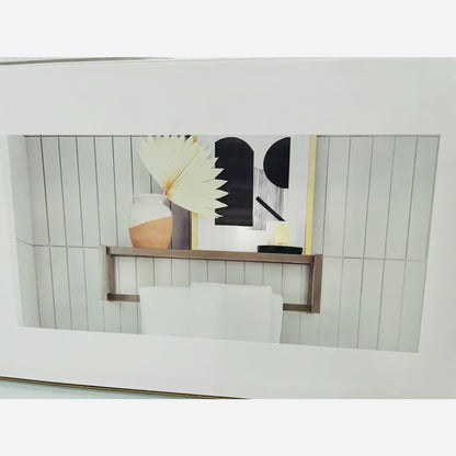 Decorative shelf with a vase and abstract art against a wooden panel wall.